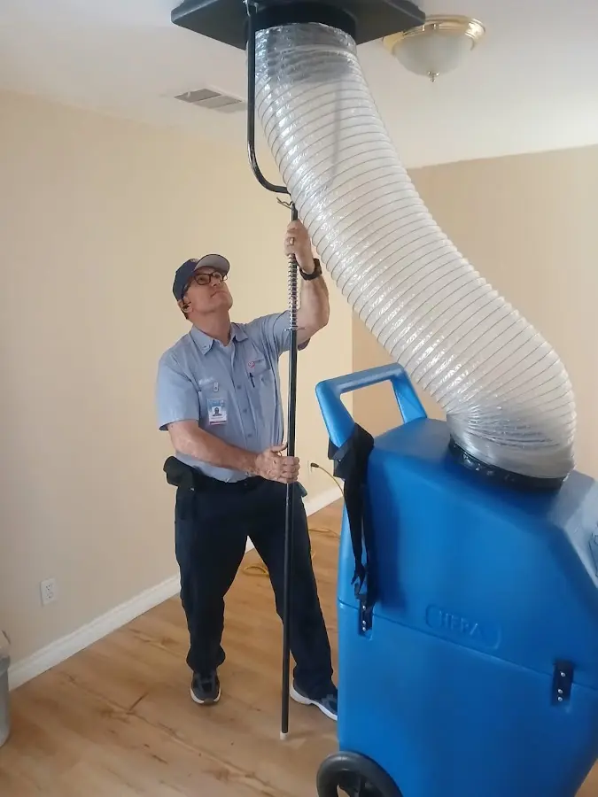 Mini Split Installation technician using HEPA equipment in Orcutt